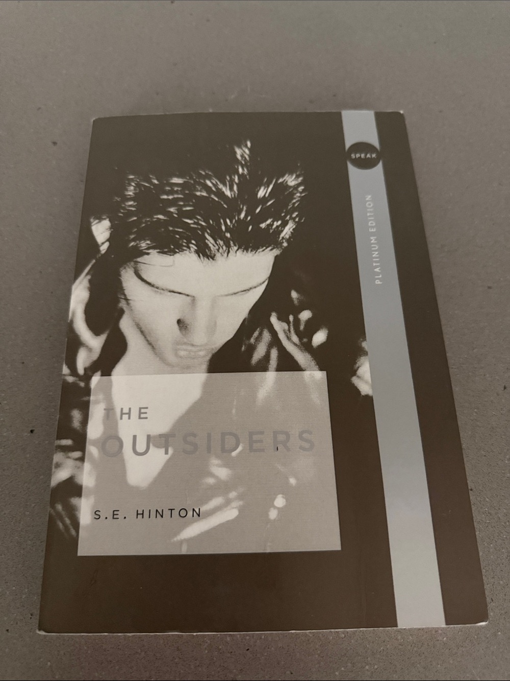 The Outsiders by S.E. Hinton - Black & White Paperback